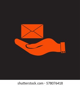 hand holding a postal envelope
