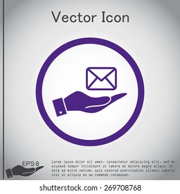 hand holding a postal envelope sign. e-mail symbol . icon envelope.