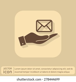 hand holding a postal envelope sign. e-mail symbol . icon envelope.