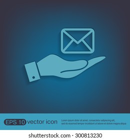 hand holding a postal envelope sign. e-mail symbol . icon envelope.