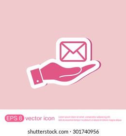 hand holding a postal envelope sign. e-mail symbol . icon envelope.