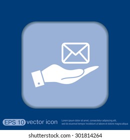 hand holding a postal envelope sign. e-mail symbol . icon envelope.