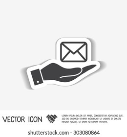 hand holding a postal envelope sign. e-mail symbol . icon envelope.