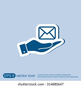 hand holding a postal envelope sign. e-mail symbol . icon envelope.