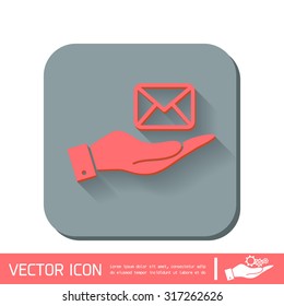 hand holding a postal envelope sign. e-mail symbol . icon envelope.