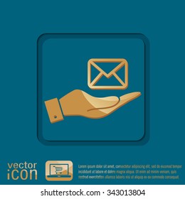 hand holding a postal envelope sign. e-mail symbol . icon envelope.