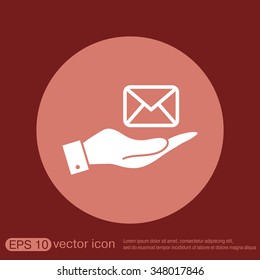 hand holding a postal envelope sign. e-mail symbol . icon envelope.