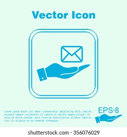 hand holding a postal envelope sign. e-mail symbol . icon envelope.