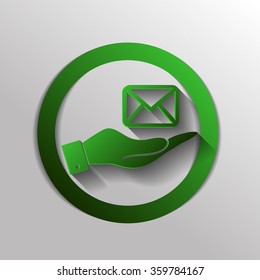 hand holding a postal envelope sign. e-mail symbol . icon envelope.