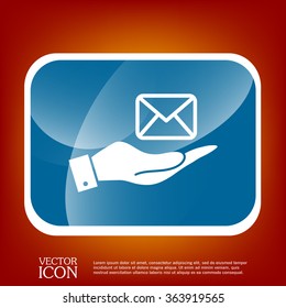 hand holding a postal envelope sign. e-mail symbol . icon envelope.