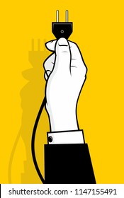 Hand holding power plug