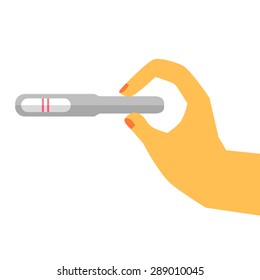 Hand - Holding Pregnancy Test Pack (Positive) 