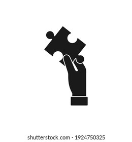 Hand holding puzzle. Solution and strategy icon concept isolated on white background. Vector illustration