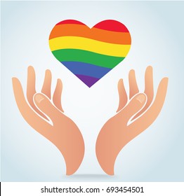 hand holding the rainbow flag in heart shape icon vector, 