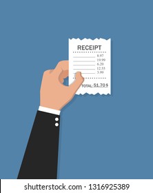 Hand holding receipt