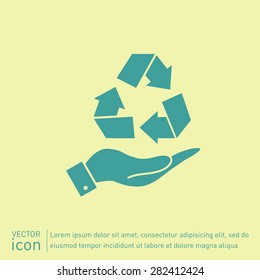 hand holding recycle symbol
