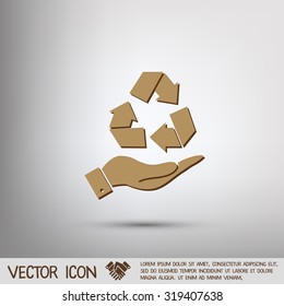 hand holding recycle symbol