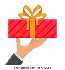 Hand holding red gift box with yellow ribbon, vector illustration