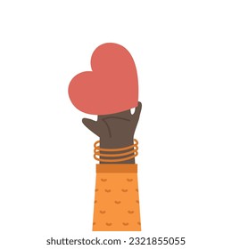 Hand holding a red heart