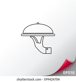 Hand holding restaurant cloche