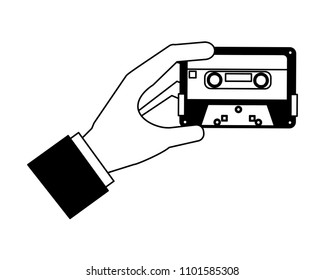 hand holding retro vintage cassette tape record