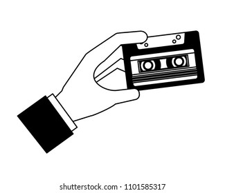 hand holding retro vintage cassette tape record