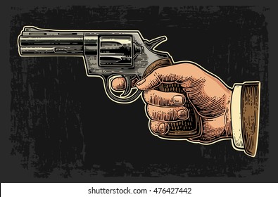 Hand holding revolver for fired. Vector color engraving vintage illustrations. Isolated on dark background. For tattoo, web, shooting club and label