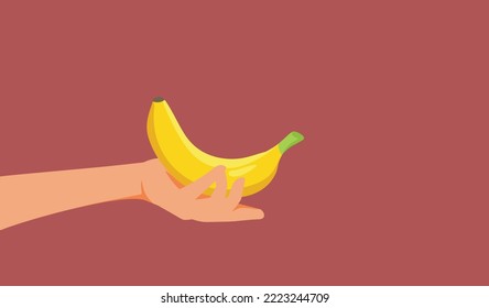 
Mano sosteniendo una ilustración de un vector de plátano amarillo maduro. La persona que tenga una súper fruta llena de potasio añada vitamina B6
