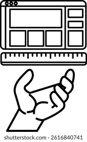 A hand holding a ruler over a computer monitor