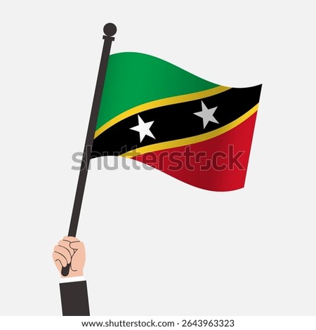 Hand Holding Saint kitts and Nevis Waving Flag