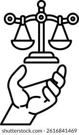 A hand holding a scale with the word justice on it