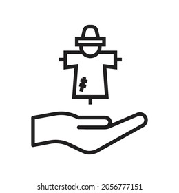 Hand holding scarecrow icon design vector illustration