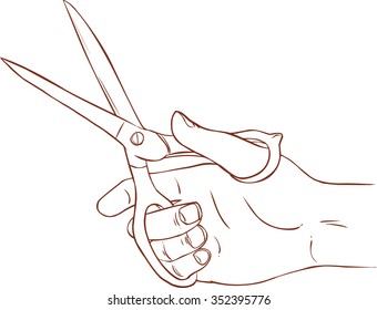 hand holding scissors (scissors in hand)