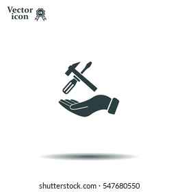 hand holding a screwdriver and wrench, symbol settings sign