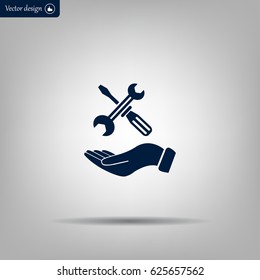 hand holding a screwdriver and wrench, symbol settings sign