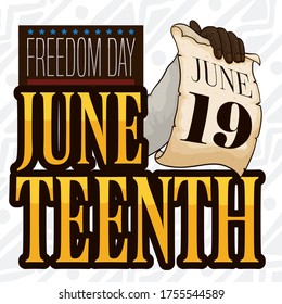 
Hand holding scroll with reminder date to commemorate Juneteenth  -also called Freedom Day- in June 19.