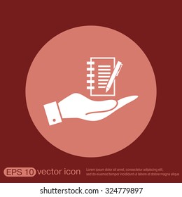 hand holding a sheet of paper and pen