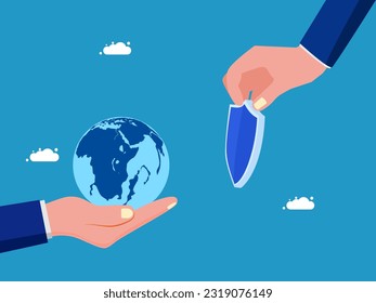 Mano sosteniendo un escudo y un globo. proteger la tierra 