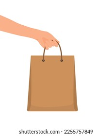 Hand holding shopping bag paper