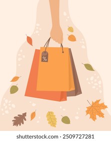 Mano que sostiene bolsas de compras y hojas de otoño que caen alrededor sobre fondo beige. Anuncio de la venta del otoño. Ilustración vectorial plana