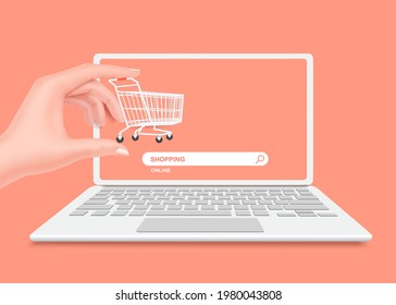 Hand holding a shopping cart in front of a laptop computer or notebook computer And there is an online shopping store search icon underneath and all object on pastel pink bacground,vector 3d isolated