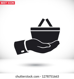 hand holding a shopping cart online store. icon. Vector Eps 10