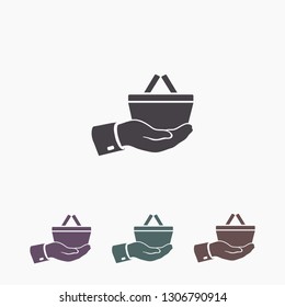 hand holding a shopping cart online store. icon. Vector Eps 10