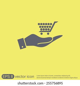hand holding a shopping cart online store, Internet shop. basket shopping