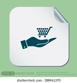 hand holding a shopping cart online store, Internet shop. basket shopping
