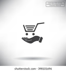 hand holding a shopping cart online store. icon. Vector Eps 10
