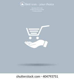 hand holding a shopping cart online store. icon. Vector Eps 10