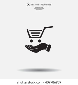 hand holding a shopping cart online store. icon. Vector Eps 10