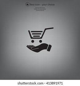 hand holding a shopping cart online store. icon. Vector Eps 10