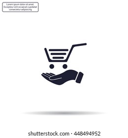 hand holding a shopping cart online store. icon. Vector Eps 10